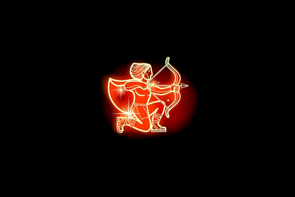 Ilustração em vermelho neon do signo de Sagitário em fundo preto