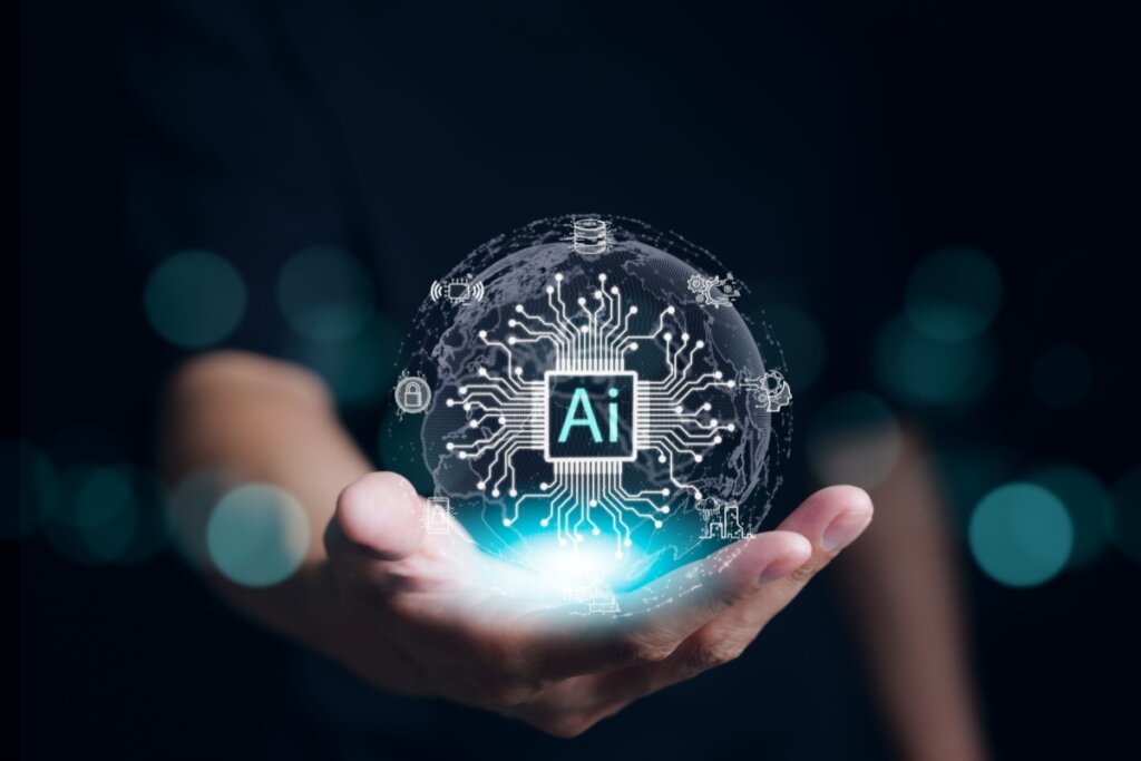 Homem com a mão estendida e em cima da mão um holograma simbolizando a Inteligência Artificial
