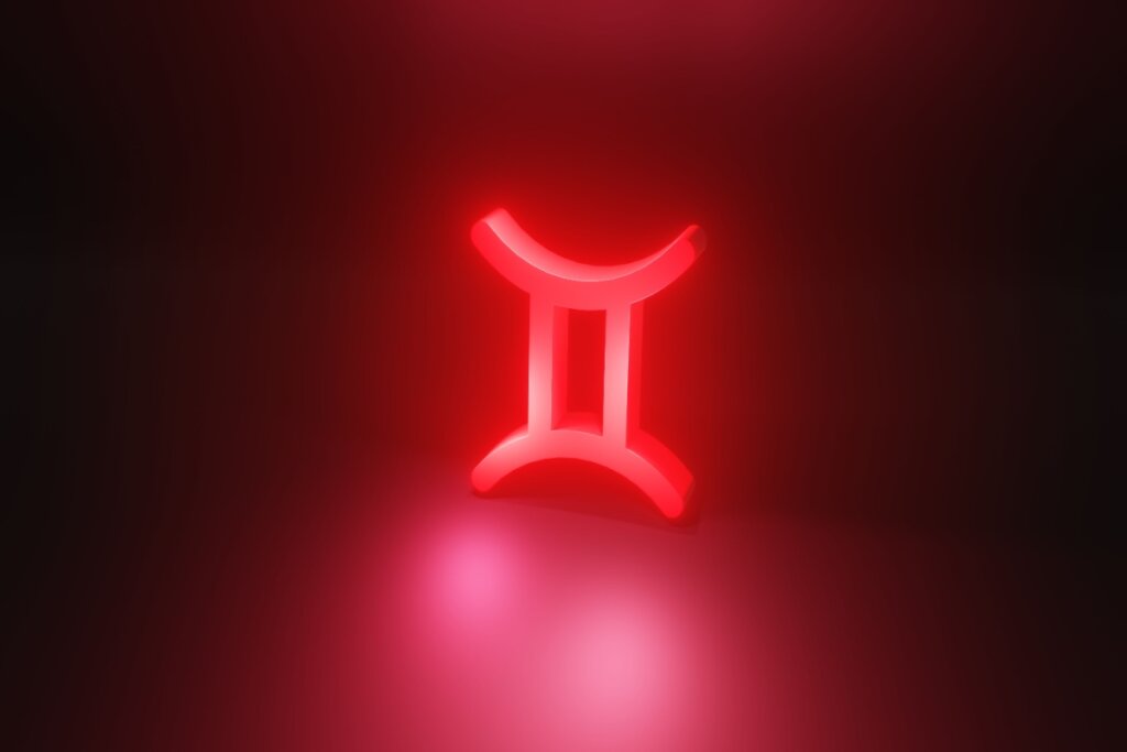 Ilustração em vermelho do símbolo do signo de Gêmeos em fundo vermelho escuro