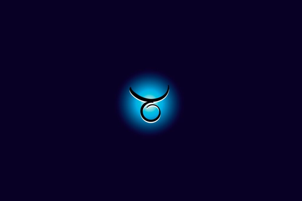 Ilustração do signo de touro iluminado com uma luz em um fundo azul escuro