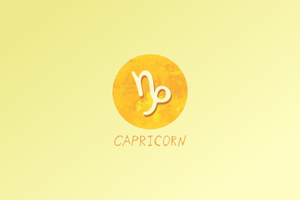 Ilustração do signo de Capricórnio, com um símbolo estilizado que remete à letra "n" seguida de uma espiral, em fundo amarelo
