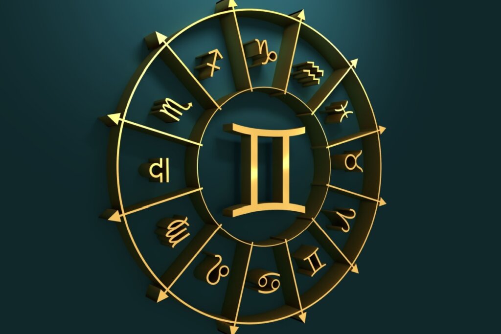 círculo em amarelo com símbolo dos 12 signos em volta, separados por flechas, com símbolo do signo de gêmeos no centro, sobre fundo verde-escuro