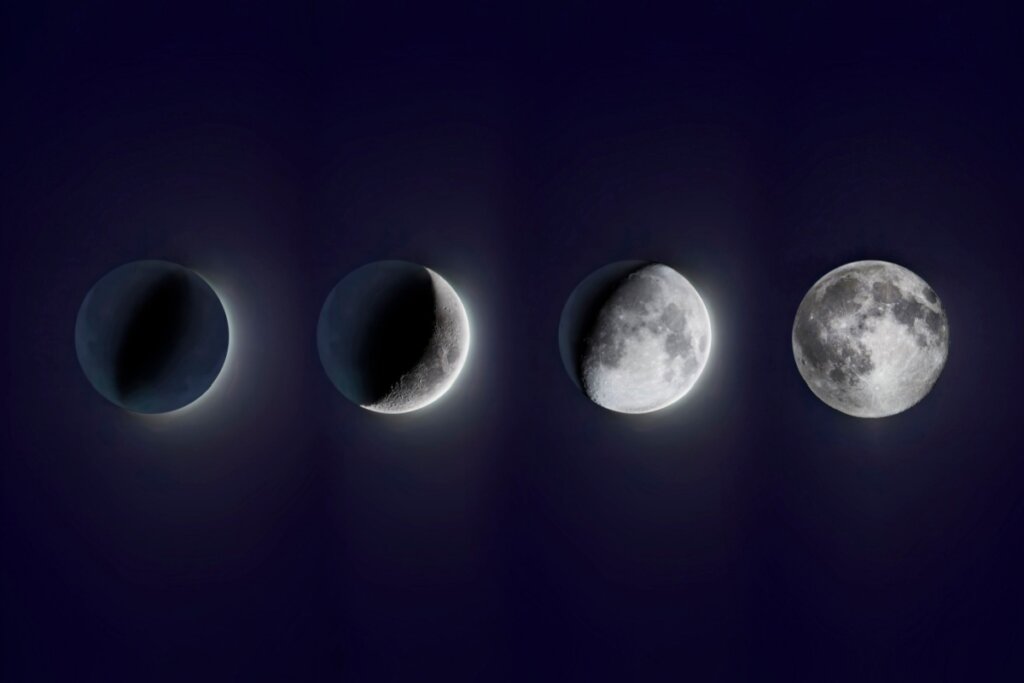 Ilustração das quatro fases da Lua em um fundo azul-escuro 