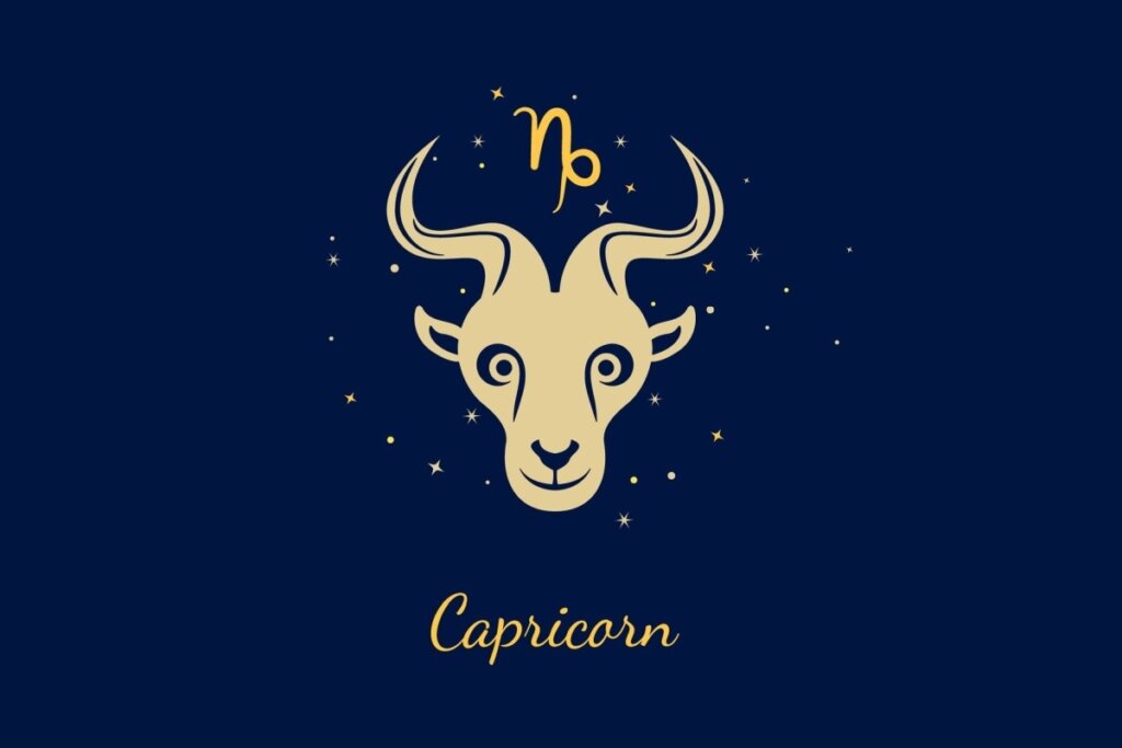 Um fundo azul-marinho escuro com ilustração estilizada da cabeça de uma cabra com chifres curvados. Acima dela, está o glifo de Capricórnio em dourado vibrante. Abaixo, o texto "Capricorn".