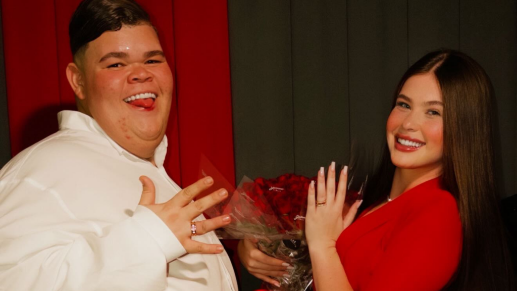 Gordão da Xj e Nicolle Caroline mostrando alianças