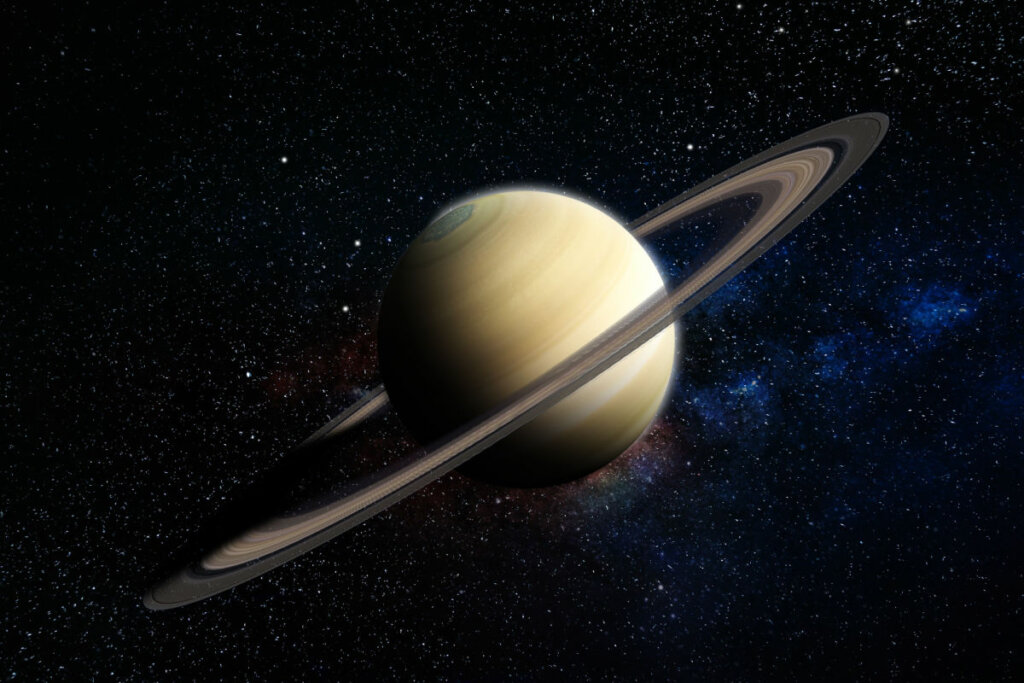 Ilustração do planeta Saturno em um fundo azul-escuro com estrelas