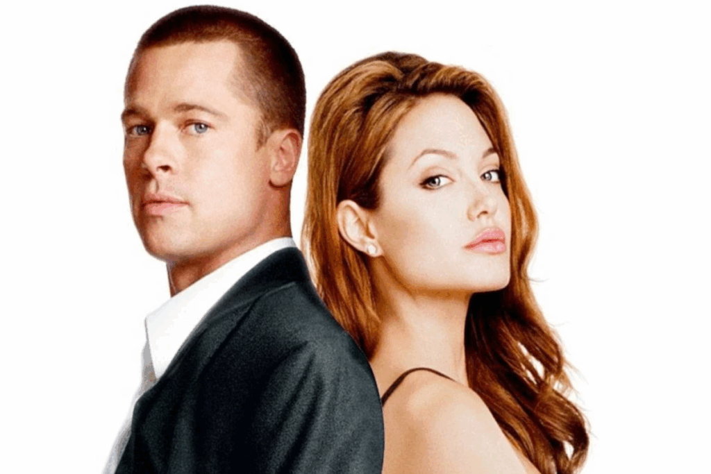 Brad Pitt e Angelina Jolie posados de costas um para o outro