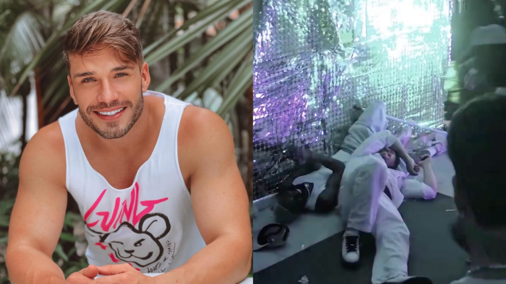 Lucas Viana no chão após cair com outro participante do reality Impulsiona House