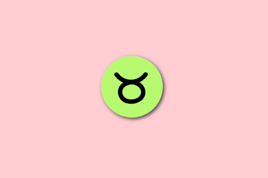 círculo verde com ilustração preta do símbolo do signo de touro sobre fundo rosa