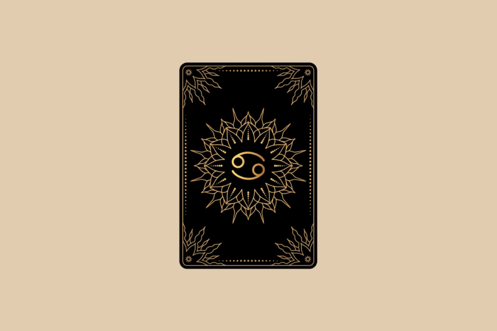 Ilustração de uma carta de tarô preta em fundo bege, com detalhes dourados em mandala e o símbolo do signo de Câncer no centro.