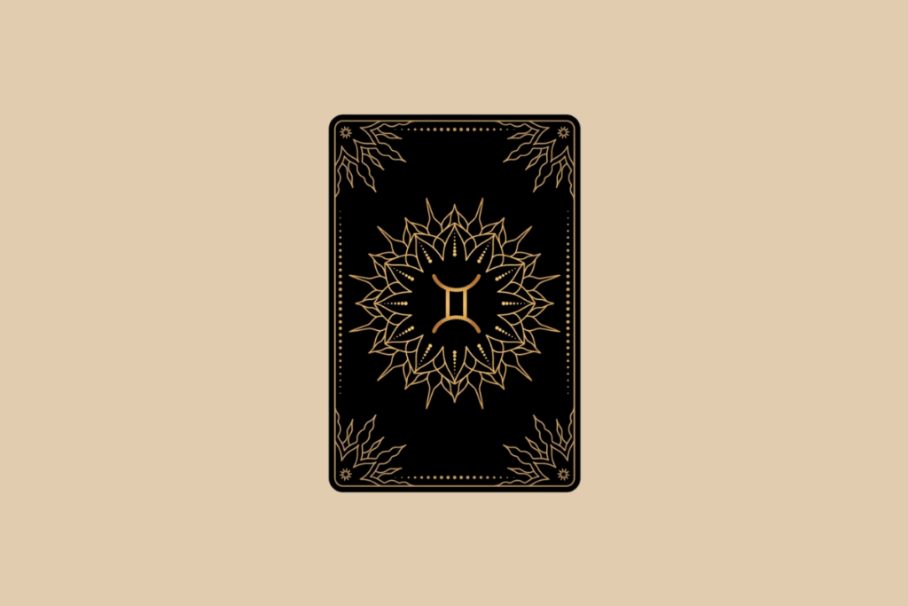 Ilustração de uma carta de tarô preta em fundo bege, com detalhes dourados em mandala e o símbolo do signo de Gêmeos no centro.