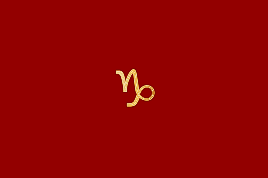 Ilustração do signo de capricórnio em dourado, centralizado em fundo vermelho