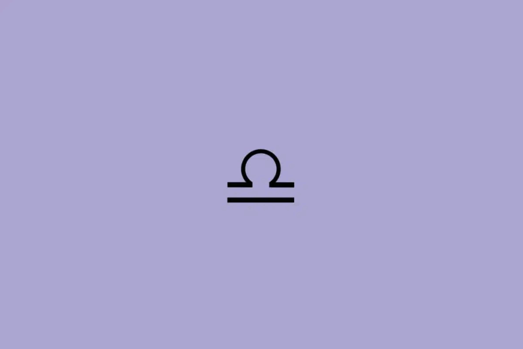 Ilustração em preto do signo de Libra em um fundo lilás