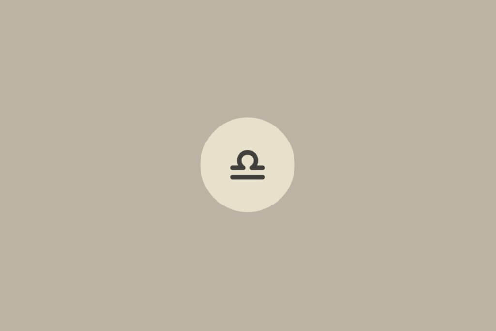 Imagem minimalista com fundo bege claro e o símbolo do signo de libra centralizado dentro de um círculo em tom mais claro