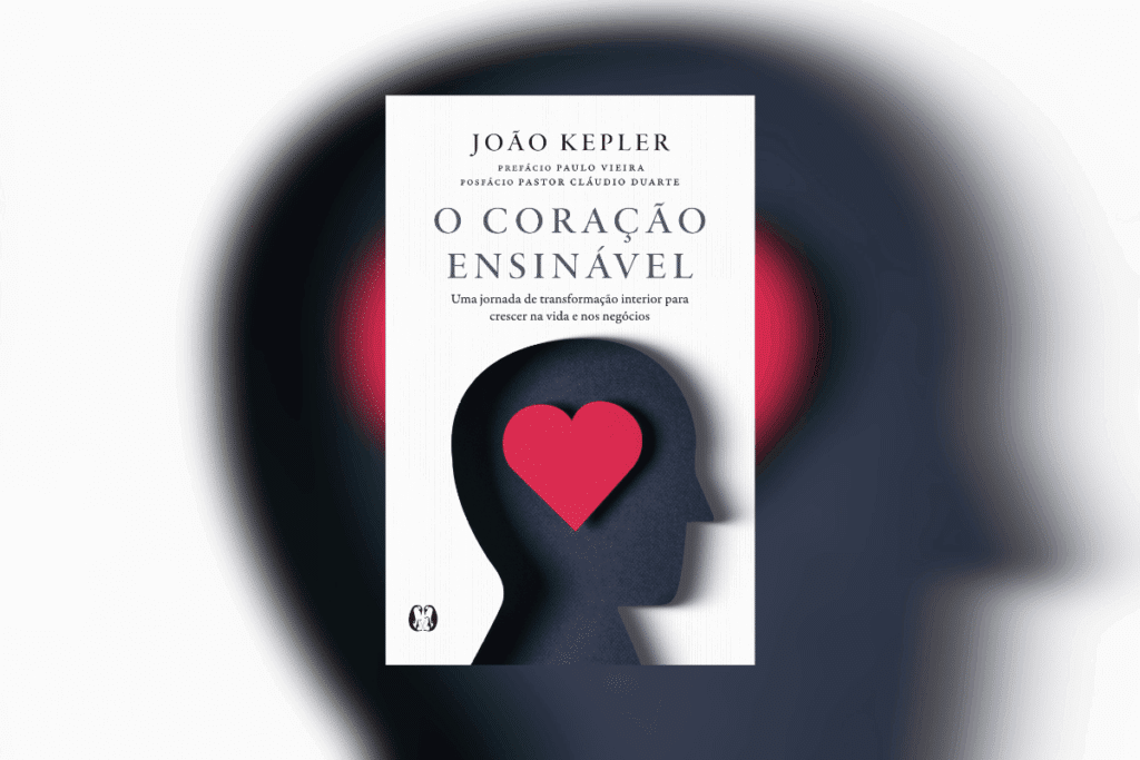 Capa de livro branca, como título e nome do autor em preto e com desenho da cabeça de uma pessoa em azul e com coração vermelho dentro