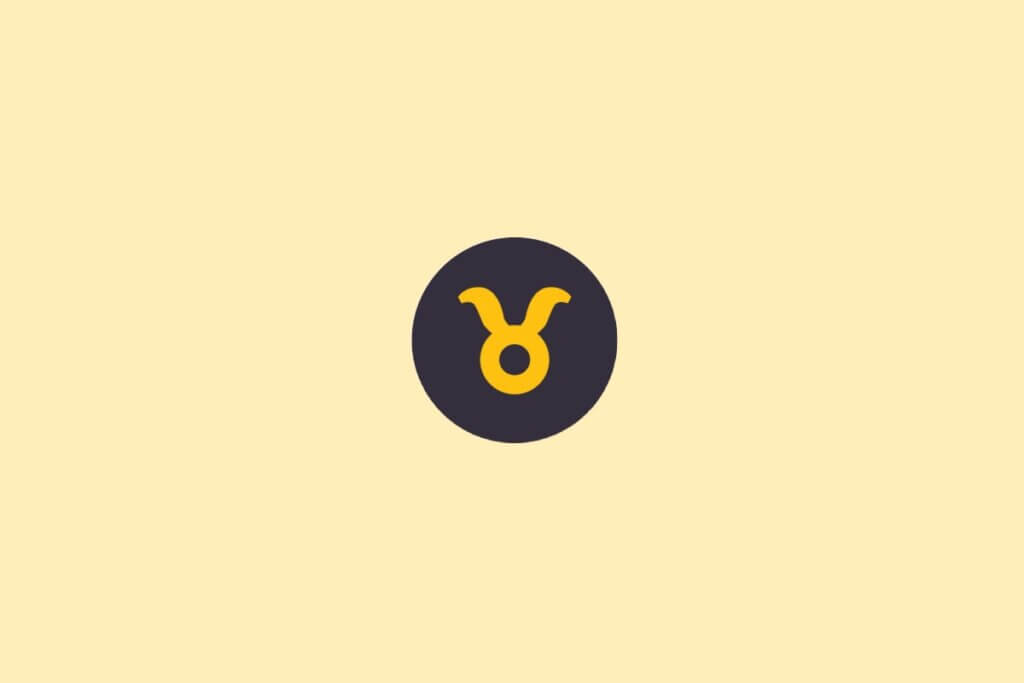 Um símbolo do signo de Touro em amarelo, dentro de um círculo escuro, sobre um fundo claro bege