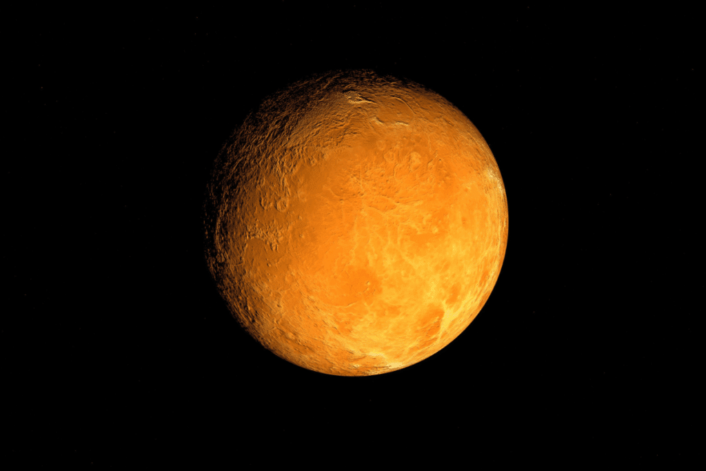 Representação em 3D do planeta Vênus destacando sua superfície alaranjada e rochosa contra a imensidão do espaço preto
