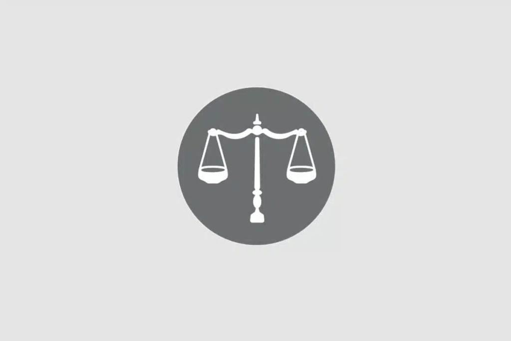 Ilustração do signo de Libra contendo uma balança, em fundo cinza 