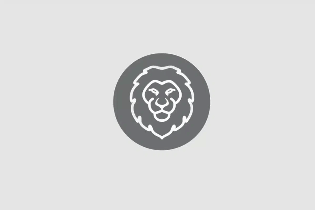 Ilustração do signo de Leão contendo a cabeça de um leão com juba, em fundo cinza