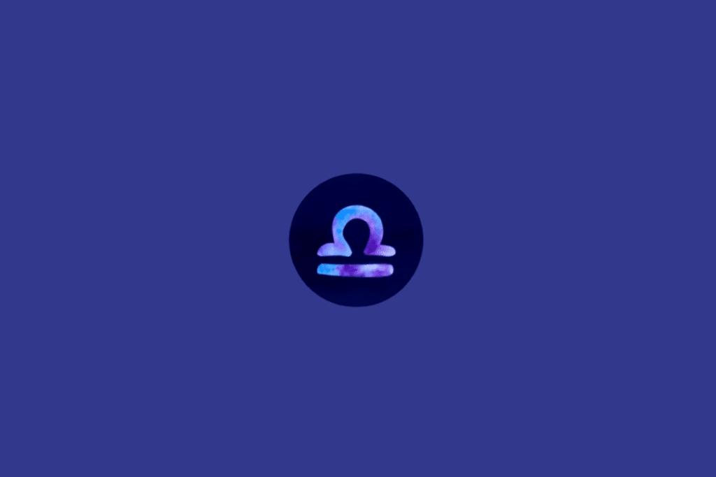 Símbolo do signo de Libra em tons de roxo e azul em círculo azul escuro, em fundo azul.