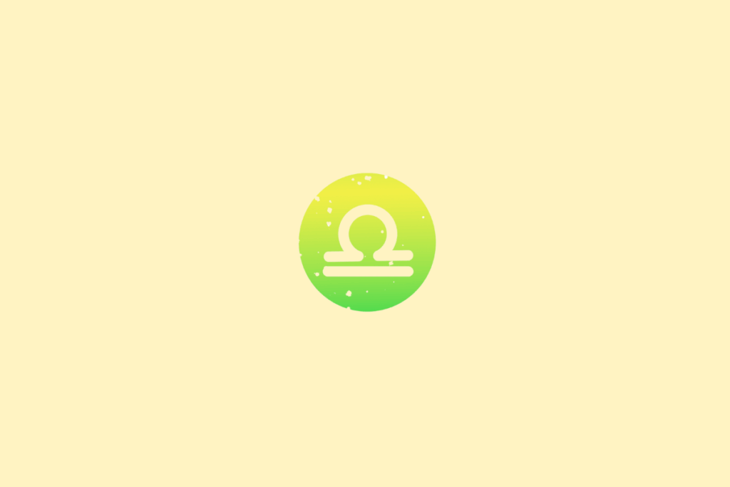 Ilustração minimalista do signo de Libra, representado pelo símbolo de uma balança estilizada em tom creme. A figura aparece dentro de um círculo em degradê de verde e amarelo, com pequenos pontos decorativos e fundo amarelo-claro.