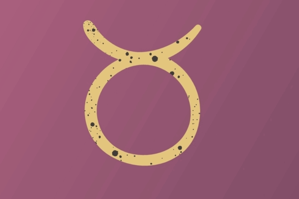 A imagem apresenta o símbolo do signo de touro em tom dourado, centralizado sobre um fundo roxo escuro. O símbolo possui pequenos detalhes e manchas escuras que criam um efeito texturizado e artístico.
