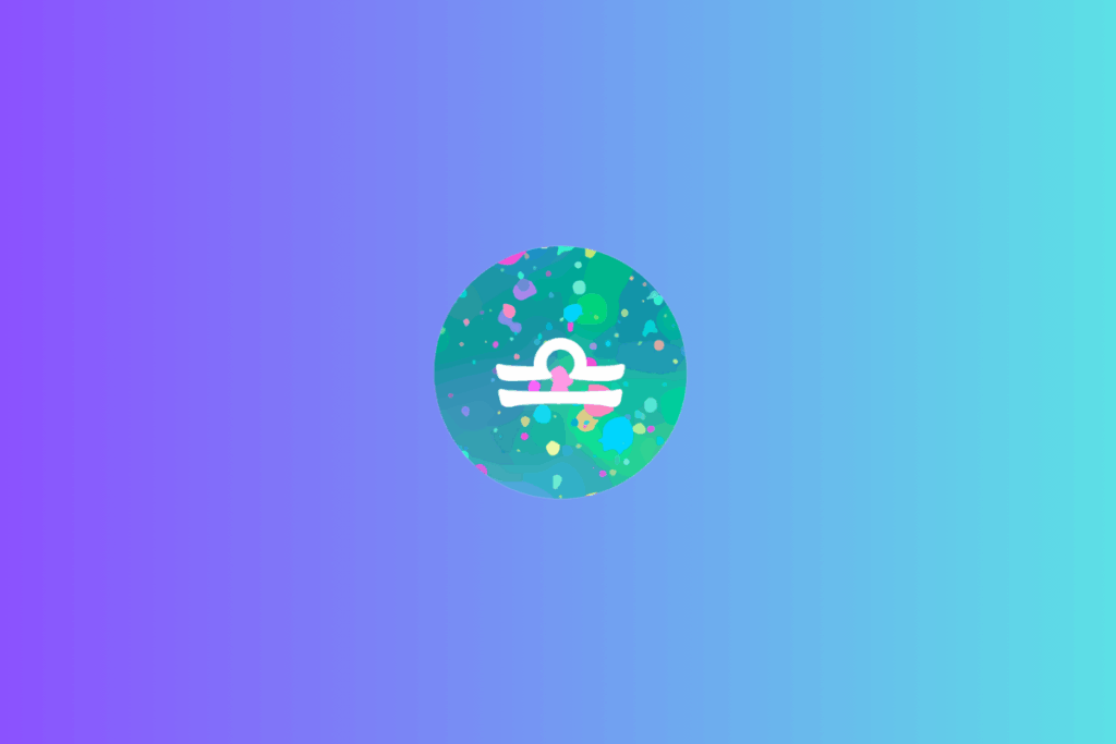 Símbolo do signo de Libra, em branco, formado por um arco na parte superior e duas linhas horizontais paralelas abaixo. O desenho aparece dentro de um círculo preenchido por manchas e pontos em azul, turquesa, verde, rosa, amarelo e roxo. O fundo apresenta um degradê que transita do roxo ao azul-claro e turquesa.