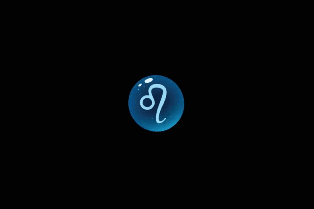 Imagem com fundo preto, apresentando uma esfera azul brilhante no centro, com o símbolo astrológico do signo de Leão em azul-claro, formado por um pequeno círculo à esquerda e uma linha curva alongada à direita. A esfera possui efeito tridimensional, pequenos pontos luminosos e reflexos brancos na parte superior.