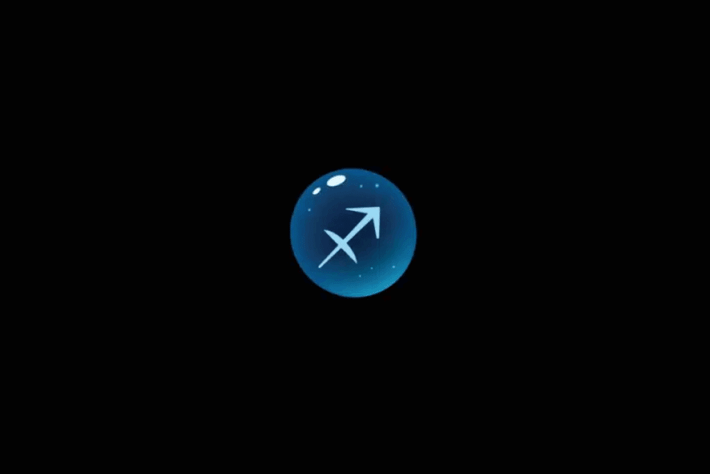Imagem com fundo preto, apresentando uma esfera azul brilhante no centro, com o símbolo astrológico do signo de Sagitário em azul-claro, representado por uma flecha diagonal apontando para cima e para a direita. A esfera possui efeito tridimensional, pequenos pontos luminosos e reflexos brancos na parte superior.