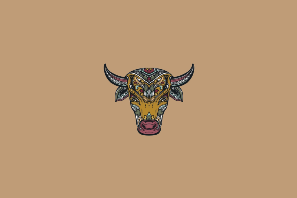 Ilustração do símbolo do signo de Touro, representado pela cabeça de um touro de frente, com chifres largos e detalhes ornamentais coloridos em estilo artístico sobre fundo bege.