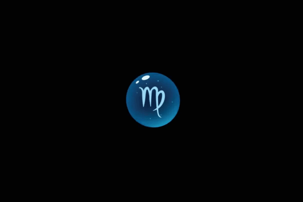 Imagem com fundo preto, apresentando uma esfera azul brilhante no centro, com o símbolo astrológico do signo de Virgem em azul-claro, semelhante à letra “M”, com uma extensão curva que se fecha sobre si mesma. A esfera possui efeito tridimensional, pequenos pontos luminosos e reflexos brancos na parte superior.